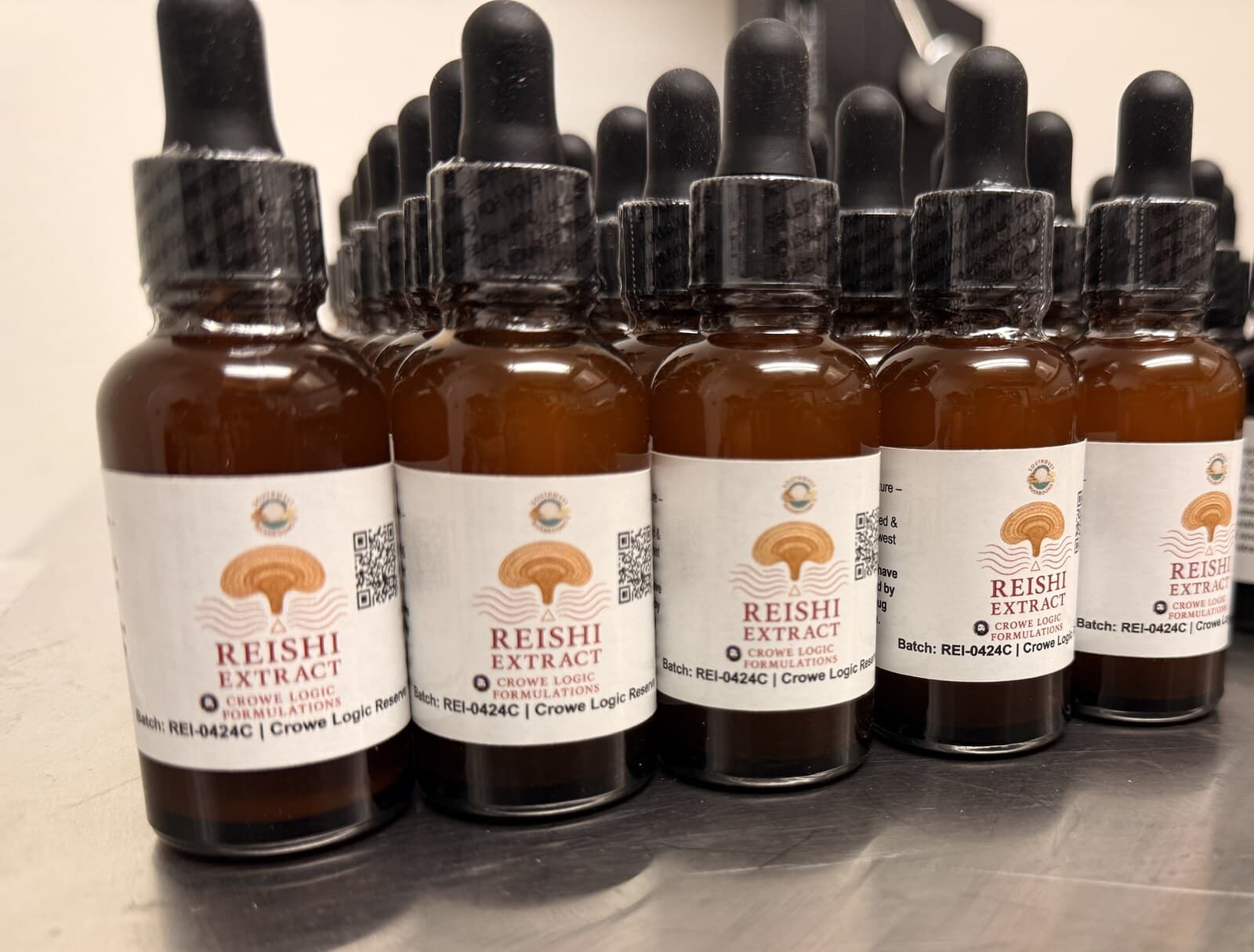 Reishi extract in 30 ml dropper bottles, labelled and batch numbered